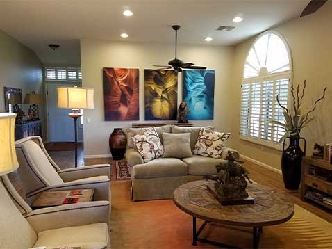 Living room with shutters in soft lighting 